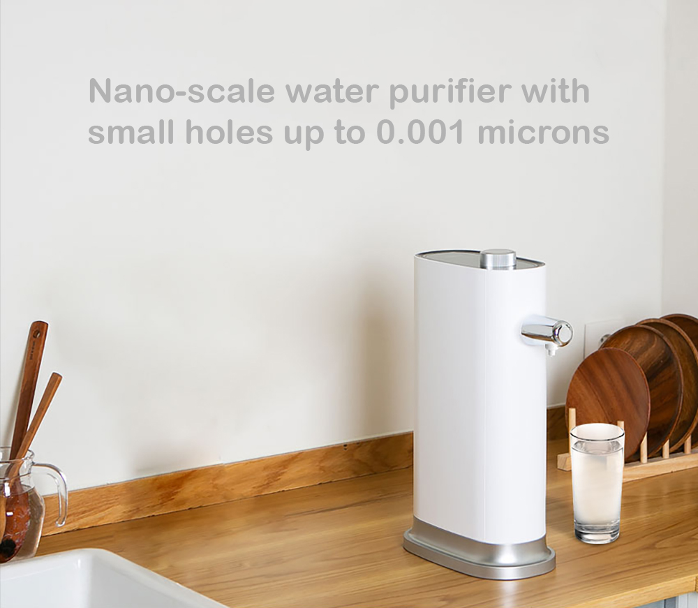 Countertop Nano Water Purifier with millions of holes up to 0.001 microns.